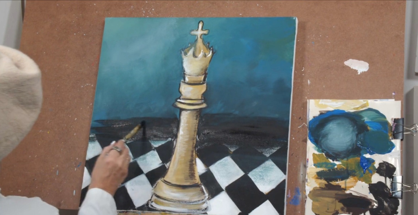 Painting of a white chess king on a checkered board in progress
